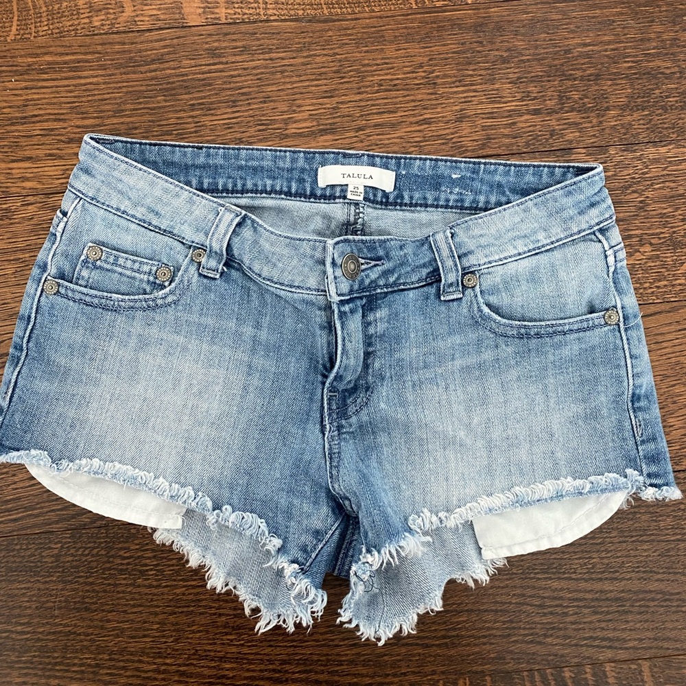 Talula low waisted mini jean shorts size 25.
